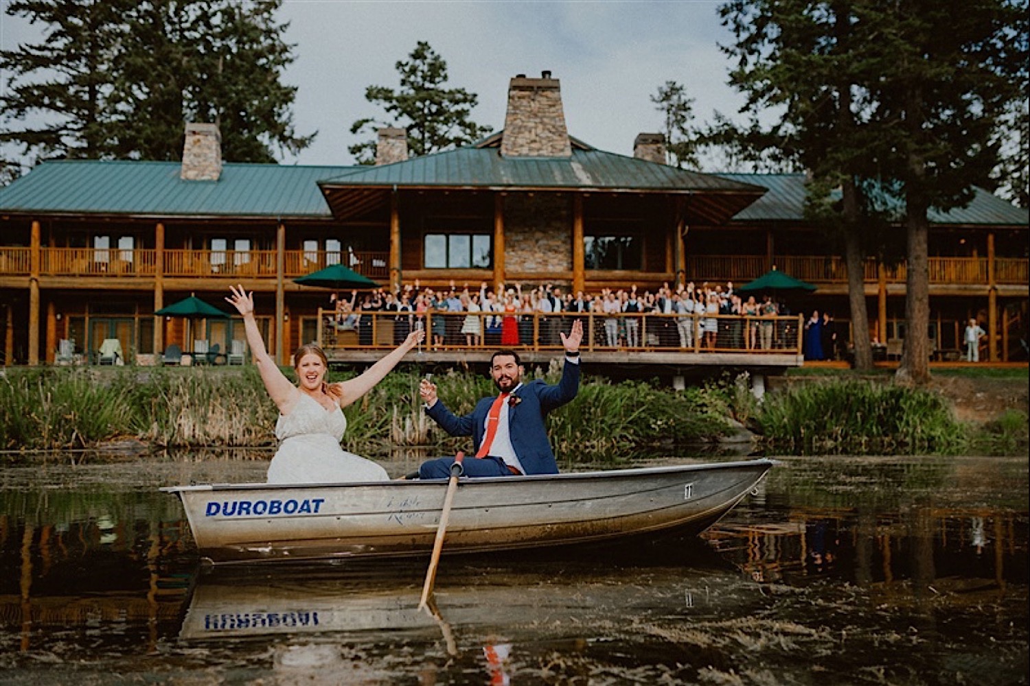 bride and groom on a boat Lakedale Resort