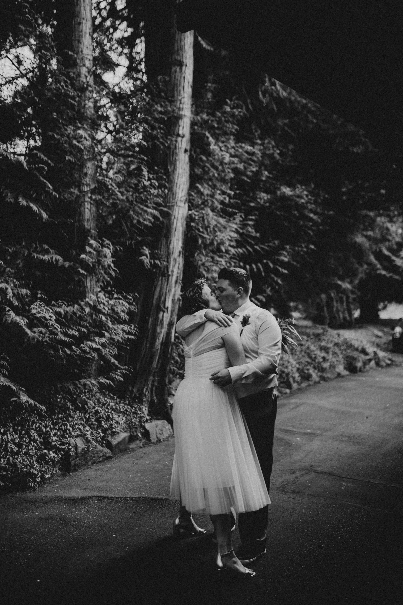 Bride and Groom kiss after their wedding ceremony picture taken in black and white | Seattle Wedding Photographer, Seattle Elopement Photographer | chelseaabril.com