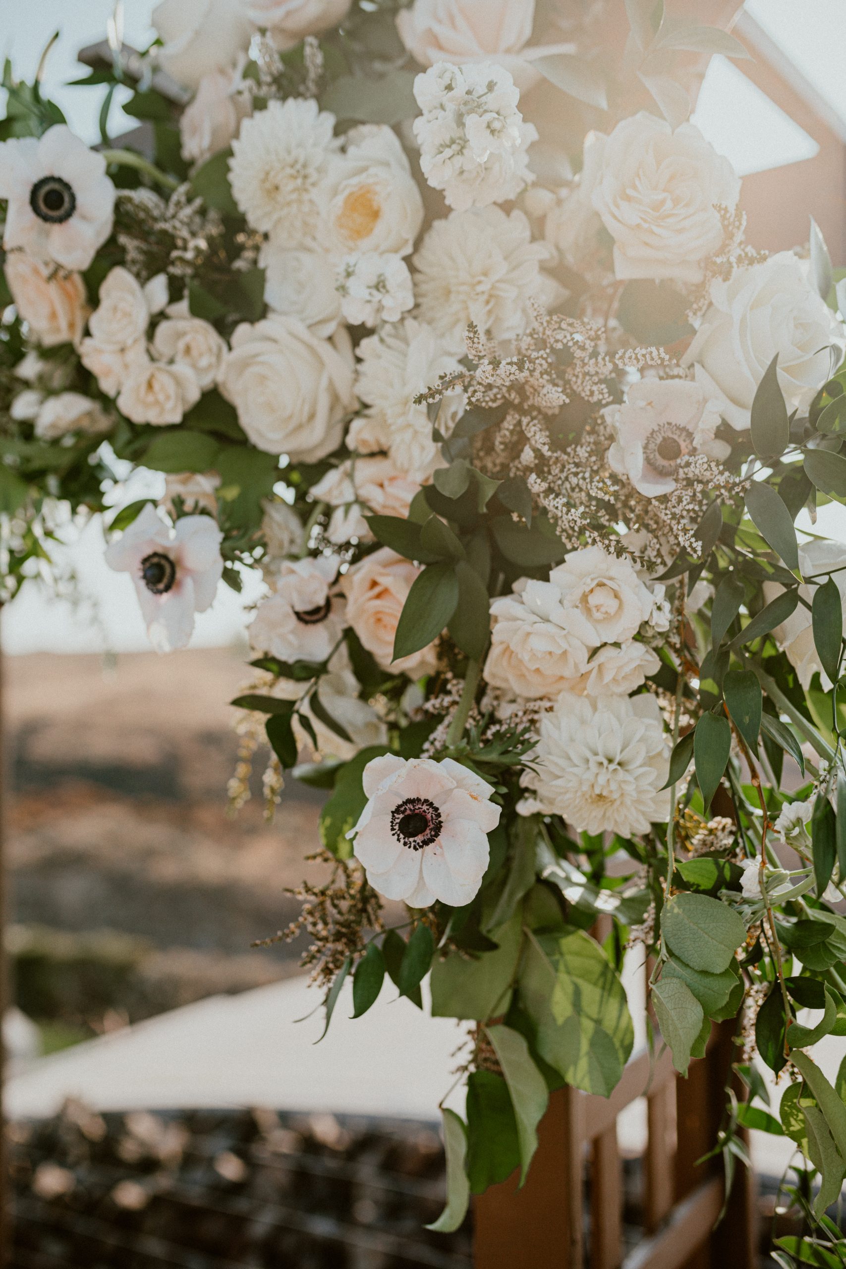 detail shots of white wedding day floral bouquets and wedding arch inspiration for Fall wedding day decor | Washington Elopement, Destination Elopement Photographer, Cave B Inn Elopement Inspiration, Washington Elopement ideas, PNW Fall Wedding Inspiration, Fall Outdoor Wedding Ideas,Fall Wedding Inspiration, PNW Outdoor Wedding Ideas | chelseaabril.com