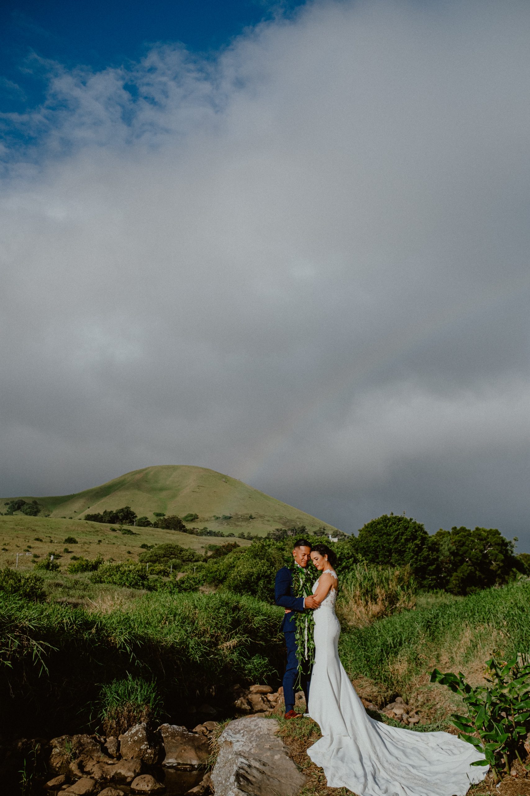 Newlywed photography inspiration of Hawaii Fall photography with rainbow over the hill at Fall wedding day photography inspiration | Big Island Elopement, Hawaii Elopement Photographer, Hawaii Elopement and Wedding Inspiration, Hawaii Elopement ideas, Big Island Wedding Inspiration, Fall Hawaiian Wedding Ideas, Fall Wedding Inspiration, Hawaii Outdoor Wedding Ideas | chelseaabril.com