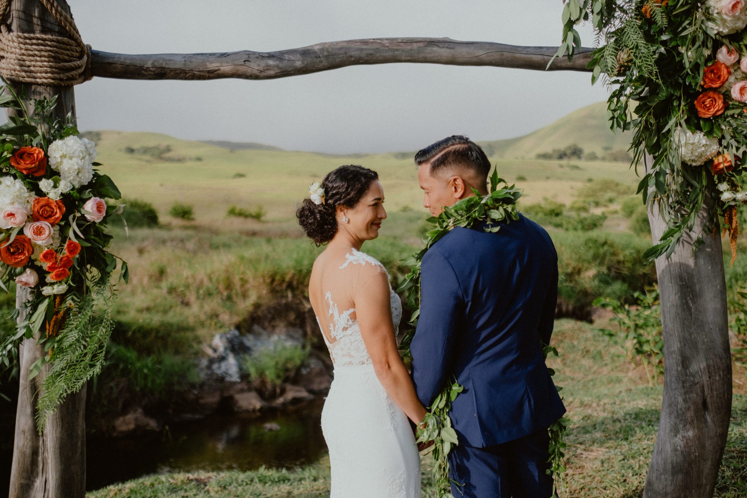 Bride and groom photography of Big Island Fall wedding day of bride with lace wedding dress and bridal style with groom in dark blue suit wedding style | Big Island Elopement, Hawaii Elopement Photographer, Hawaii Elopement and Wedding Inspiration, Hawaii Elopement ideas, Big Island Wedding Inspiration, Fall Hawaiian Wedding Ideas, Fall Wedding Inspiration, Hawaii Outdoor Wedding Ideas | chelseaabril.com