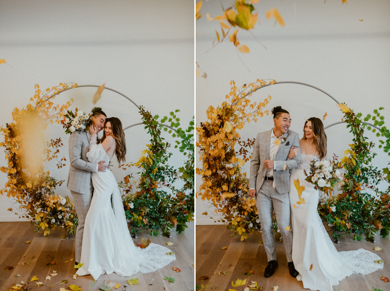 bride and groom with arbor backdrop