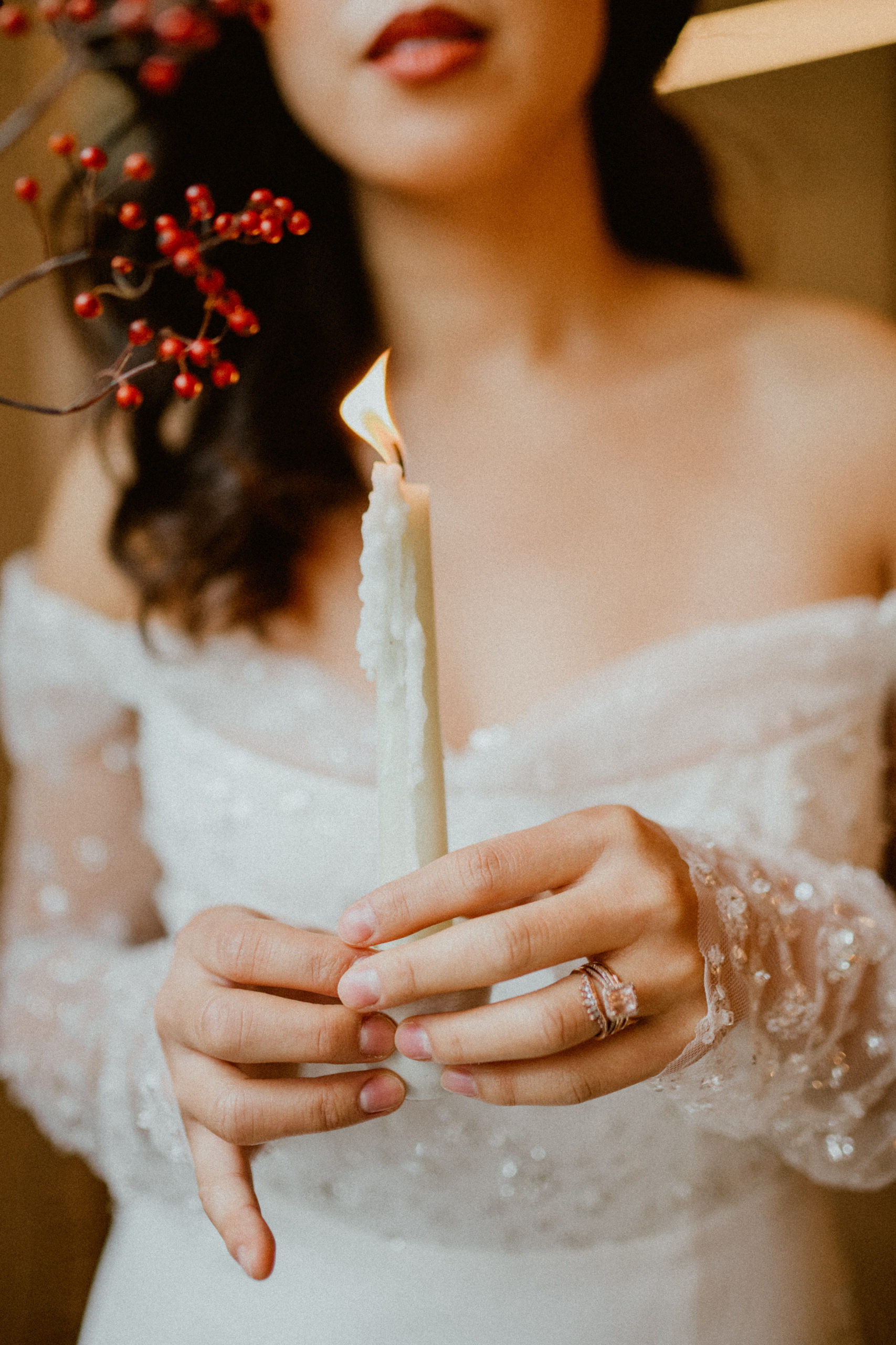 Asian bride holding a candle. Halloween style.