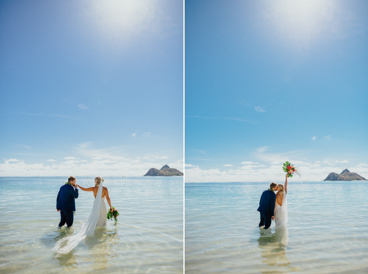 Bride and groom kiss with water spash in Lanikai Beach