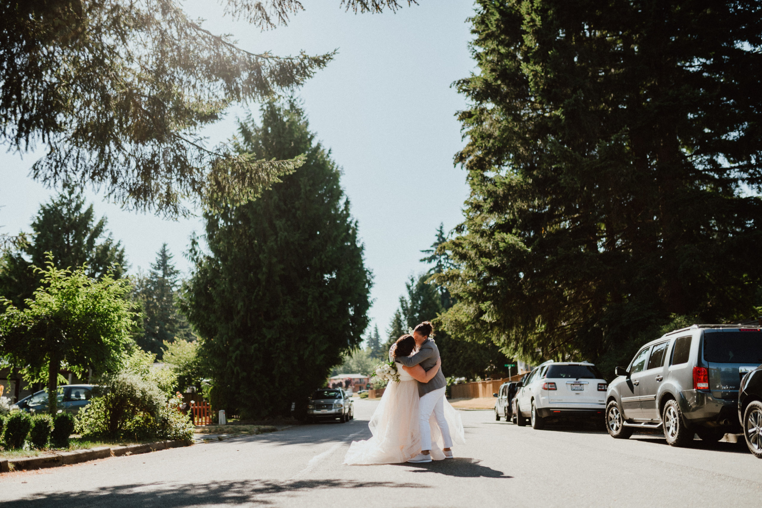 Bride and Groom dip kiss Seattle Backyard Elopement 