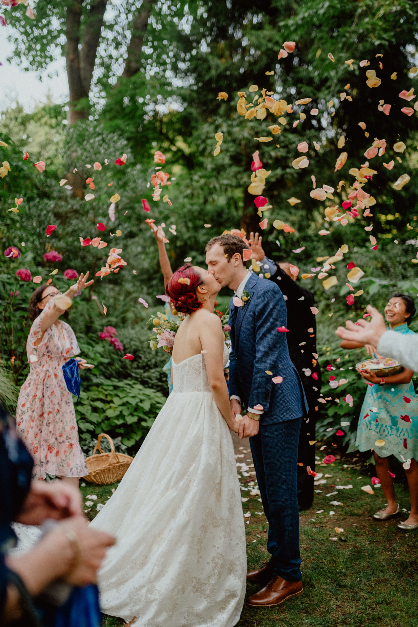 Dunn Gardens wedding, bride and groom showered with flower petals