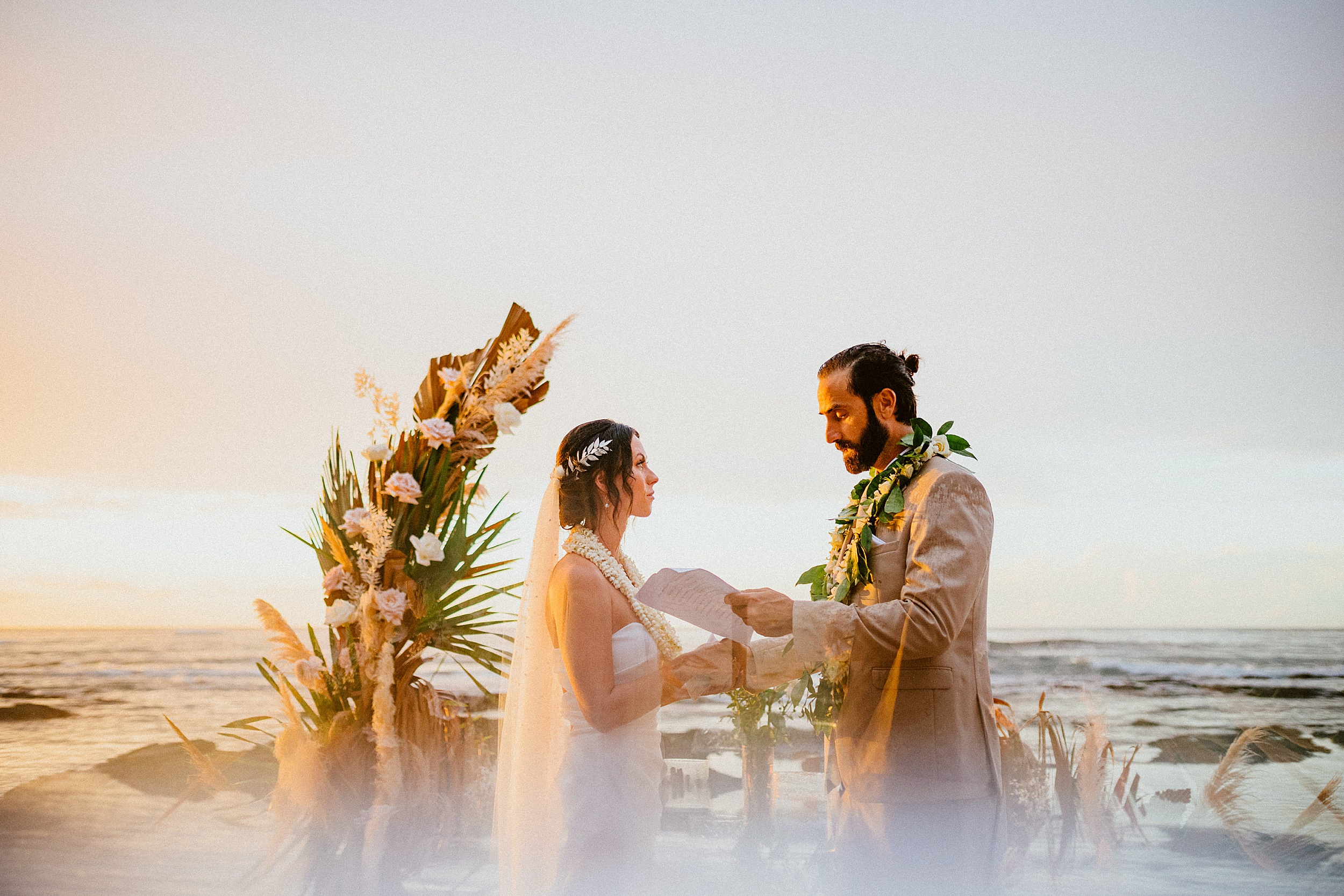 bride and groom reading vows puako hawaii landscape

